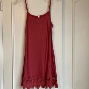 Rose medium knit camisole.  It is tunic length with adjustable straps.